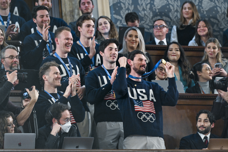 The U.S. men's Olympic ice hockey team with Connor Hellebuyck in front attend President Donald Trump's State of the Union address to a joint session of Congress in the House Chamber at the Capitol on February 24, 2026 in Washington, DC.