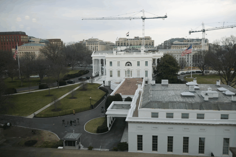 Cranes are seen on the grounds of the White House as construction work continues for U.S. President Trump's new ballroom in Washington, D.C., on Wednesday.