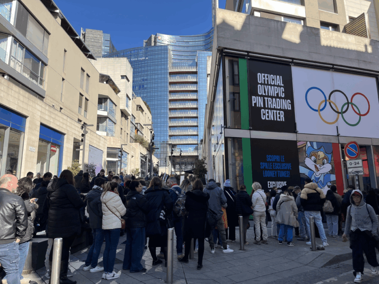On a sunny Sunday morning smack-dab in the middle of the Winter Olympics, the line to enter Milan's Official Olympic Pin Trading center was out the door and steadily growing.