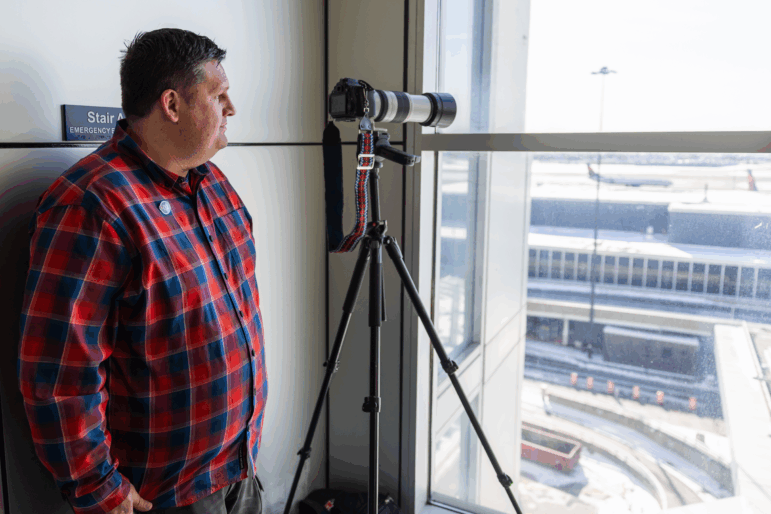 Nick Benson tracks deportation flights departing daily from Minneapolis–St. Paul International Airport in Minneapolis on Feb. 3, 2026, amid Operation Metro Surge.