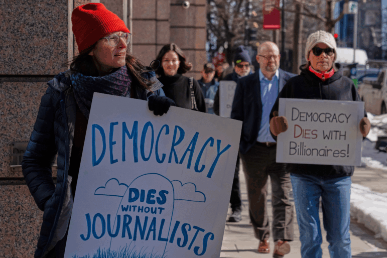 Sarah Kaplan, a Washington Post journalist, protests outside of the newspaper's headquarters on Thursday, Feb. 5, 2026. That same day, CEO Will Lewis was photographed at the NFL Honors in San Francisco.