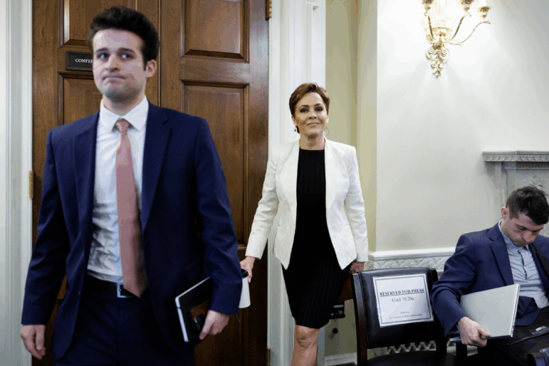 Kari Lake, senior adviser for the U.S. Agency for Global Media, departs following a House Committee on House Administration hearing on federal elections on Capitol Hill, Tuesday, Feb. 10, 2026, in Washington.