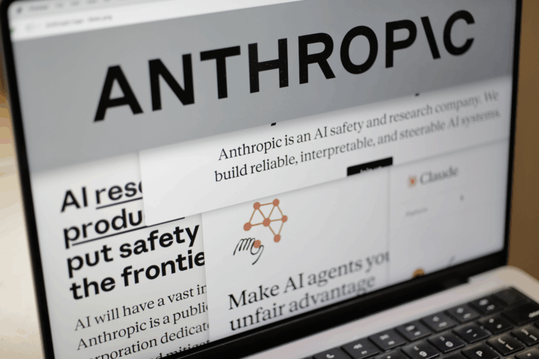 Pages from the Anthropic website and the company's logo are displayed on a computer screen in New York on Thursday, Feb. 26, 2026.