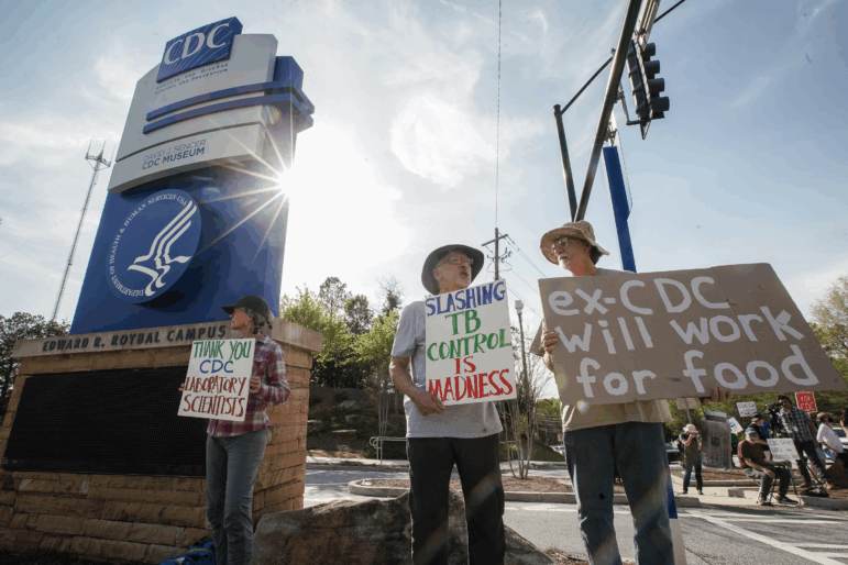 Demonstrators protest staffing cuts outside the Atlanta headquarters of the Centers For Disease Control and Prevention (CDC) on April 1, 2025. Health and Human Services Secretary Robert F. Kennedy Jr. laid off thousands of HHS employees across multiple agencies, as part of an overhaul announced in March.