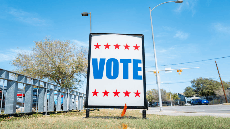 A "VOTE" sign is posted near a polling center on Tuesday in Austin, Texas. Texas held primary elections including two hotly contested races for Democratic and Republican Senate nominations.