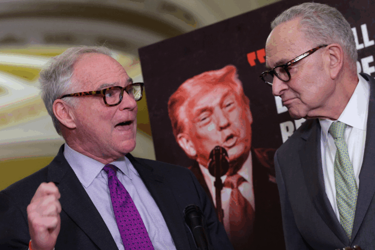 Sen. Tim Kaine, D-Va., and U.S. Senate Minority Leader Chuck Schumer, D-N.Y., speak at the Capitol on Tuesday on the recent U.S. and Israeli attacks on Iran and the upcoming war powers vote.