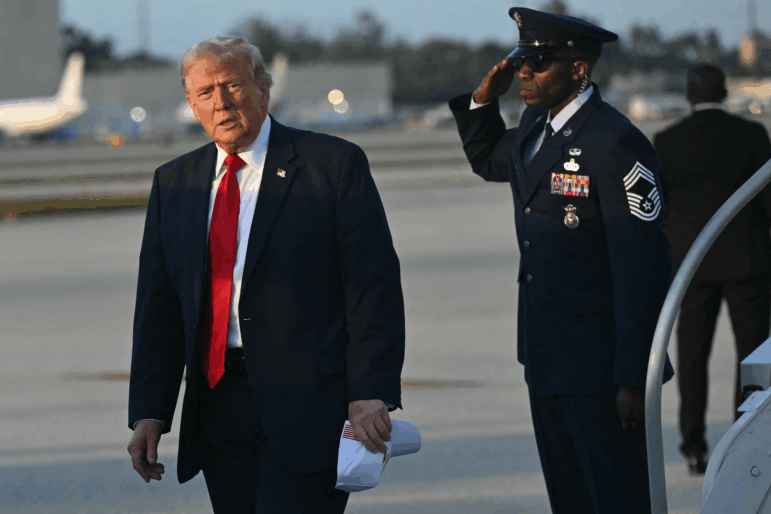 President Trump disembarks from Air Force One upon arrival at Miami International Airport in Miami on March 7.